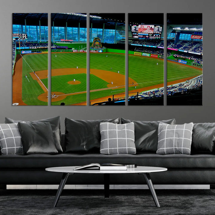 A striking three-panel Miami Marlins wall art of the LoanDepot Park stadium hangs above, enhancing the space with its premium canvas and gallery-quality finish.