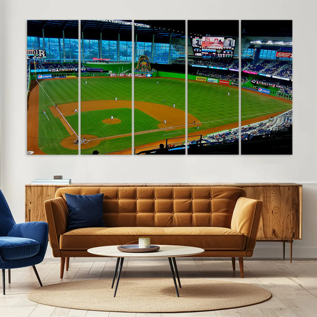 A striking three-panel Miami Marlins wall art of the LoanDepot Park stadium hangs above, enhancing the space with its premium canvas and gallery-quality finish.