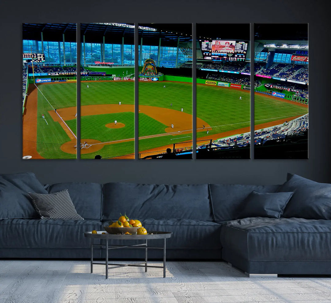 A striking three-panel Miami Marlins wall art of the LoanDepot Park stadium hangs above, enhancing the space with its premium canvas and gallery-quality finish.