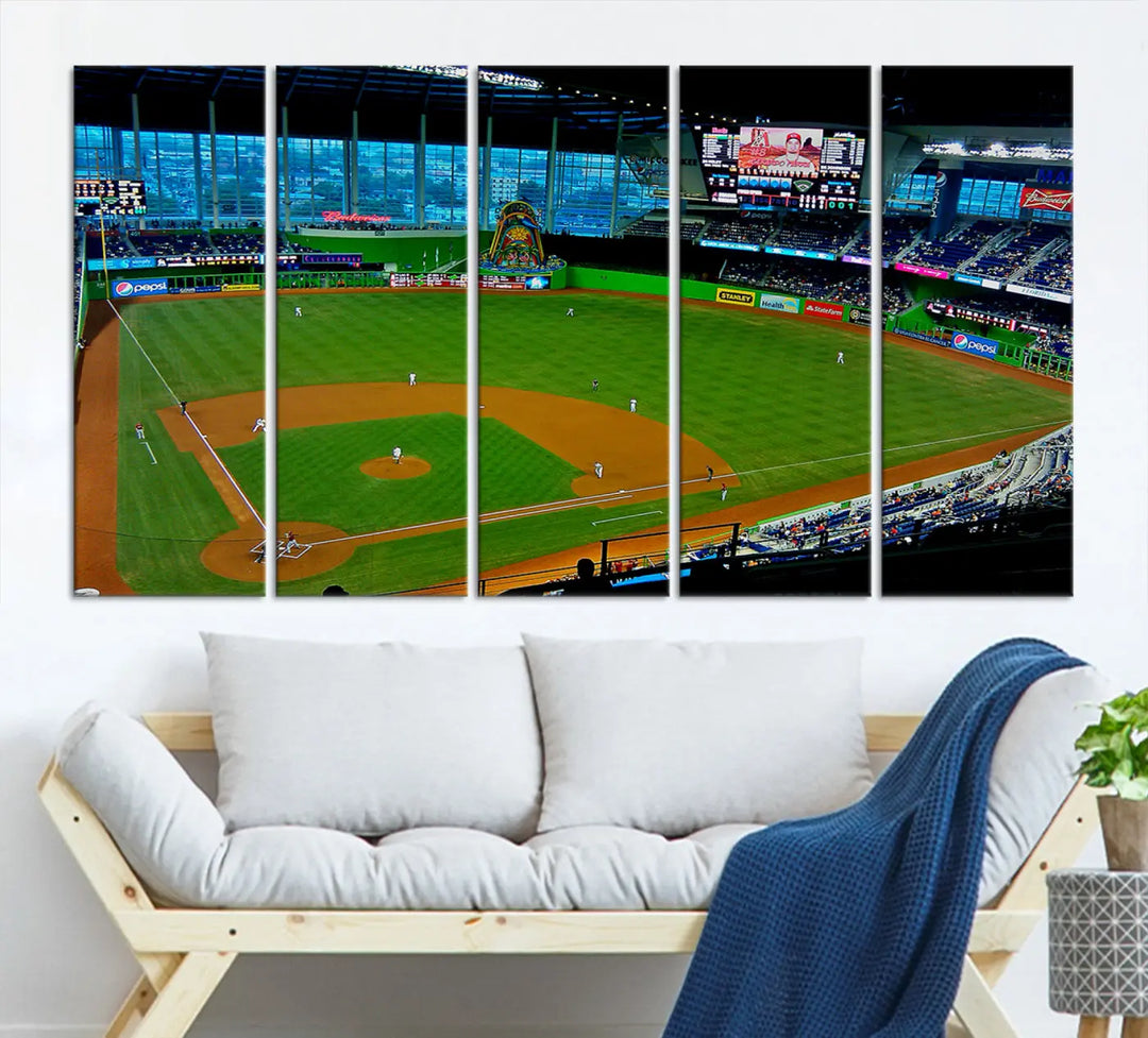 A striking three-panel Miami Marlins wall art of the LoanDepot Park stadium hangs above, enhancing the space with its premium canvas and gallery-quality finish.