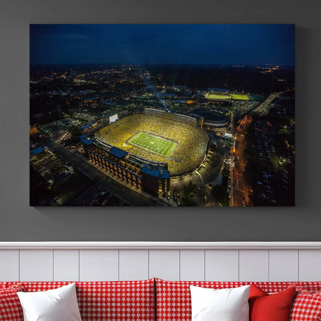 The vibrant energy of game day is perfectly captured in the Michigan Stadium Night Game Wall Art – Sports Arena Aerial View Canvas Print, framed and ready to hang.