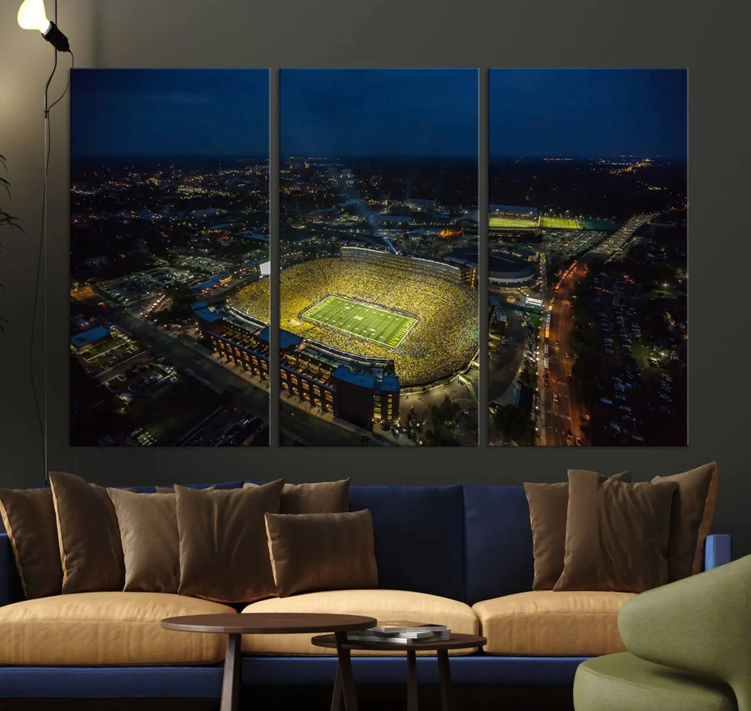 The vibrant energy of game day is perfectly captured in the Michigan Stadium Night Game Wall Art – Sports Arena Aerial View Canvas Print, framed and ready to hang.