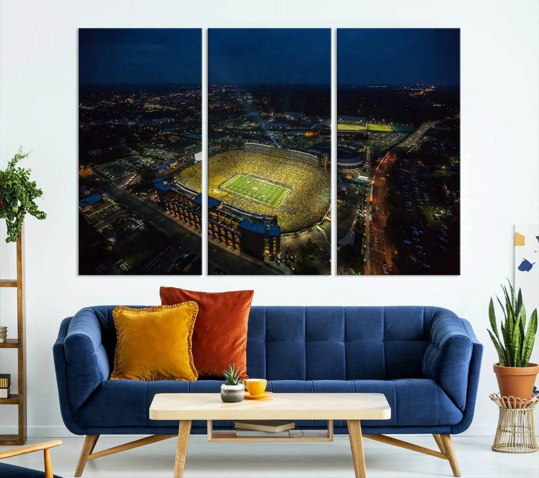 The vibrant energy of game day is perfectly captured in the Michigan Stadium Night Game Wall Art – Sports Arena Aerial View Canvas Print, framed and ready to hang.