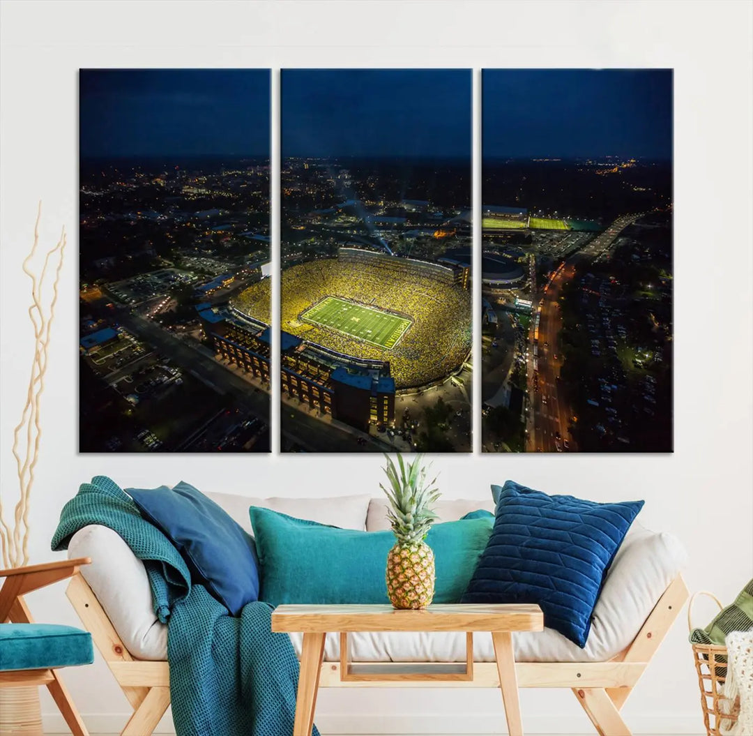 The vibrant energy of game day is perfectly captured in the Michigan Stadium Night Game Wall Art – Sports Arena Aerial View Canvas Print, framed and ready to hang.