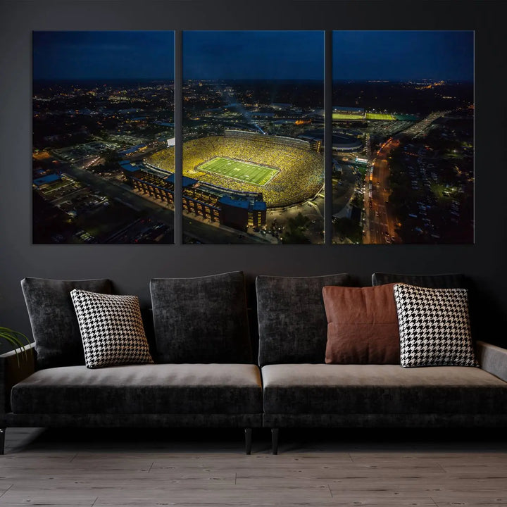 The vibrant energy of game day is perfectly captured in the Michigan Stadium Night Game Wall Art – Sports Arena Aerial View Canvas Print, framed and ready to hang.