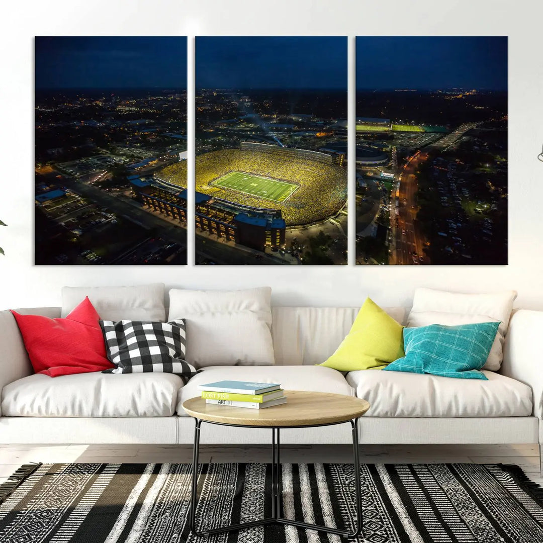 The vibrant energy of game day is perfectly captured in the Michigan Stadium Night Game Wall Art – Sports Arena Aerial View Canvas Print, framed and ready to hang.