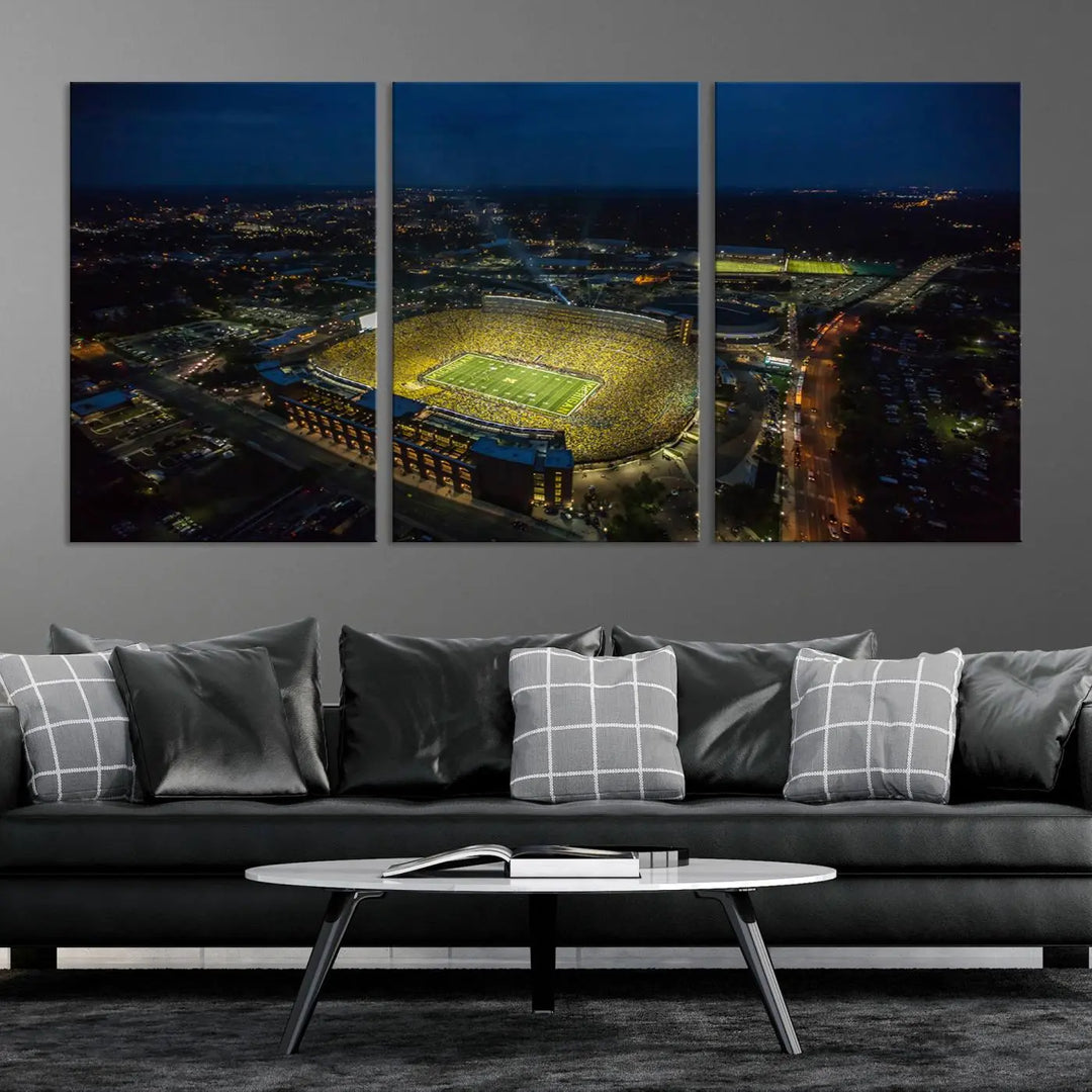 The vibrant energy of game day is perfectly captured in the Michigan Stadium Night Game Wall Art – Sports Arena Aerial View Canvas Print, framed and ready to hang.