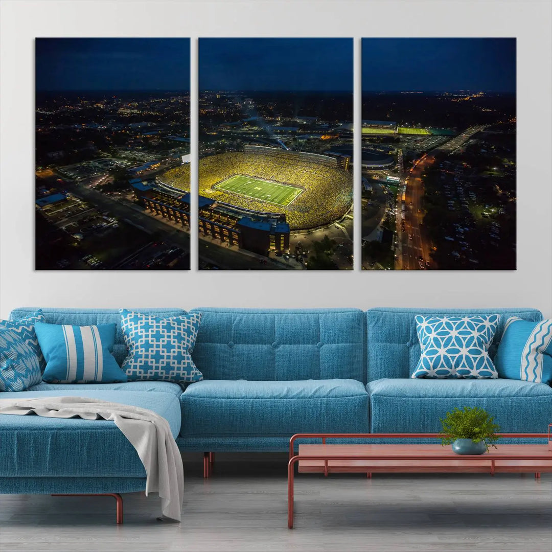 The vibrant energy of game day is perfectly captured in the Michigan Stadium Night Game Wall Art – Sports Arena Aerial View Canvas Print, framed and ready to hang.