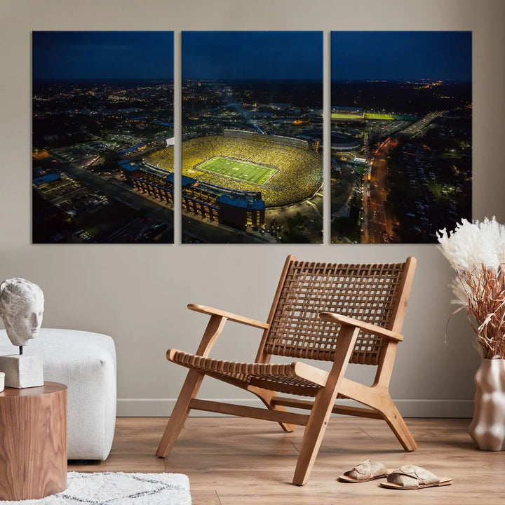 The vibrant energy of game day is perfectly captured in the Michigan Stadium Night Game Wall Art – Sports Arena Aerial View Canvas Print, framed and ready to hang.