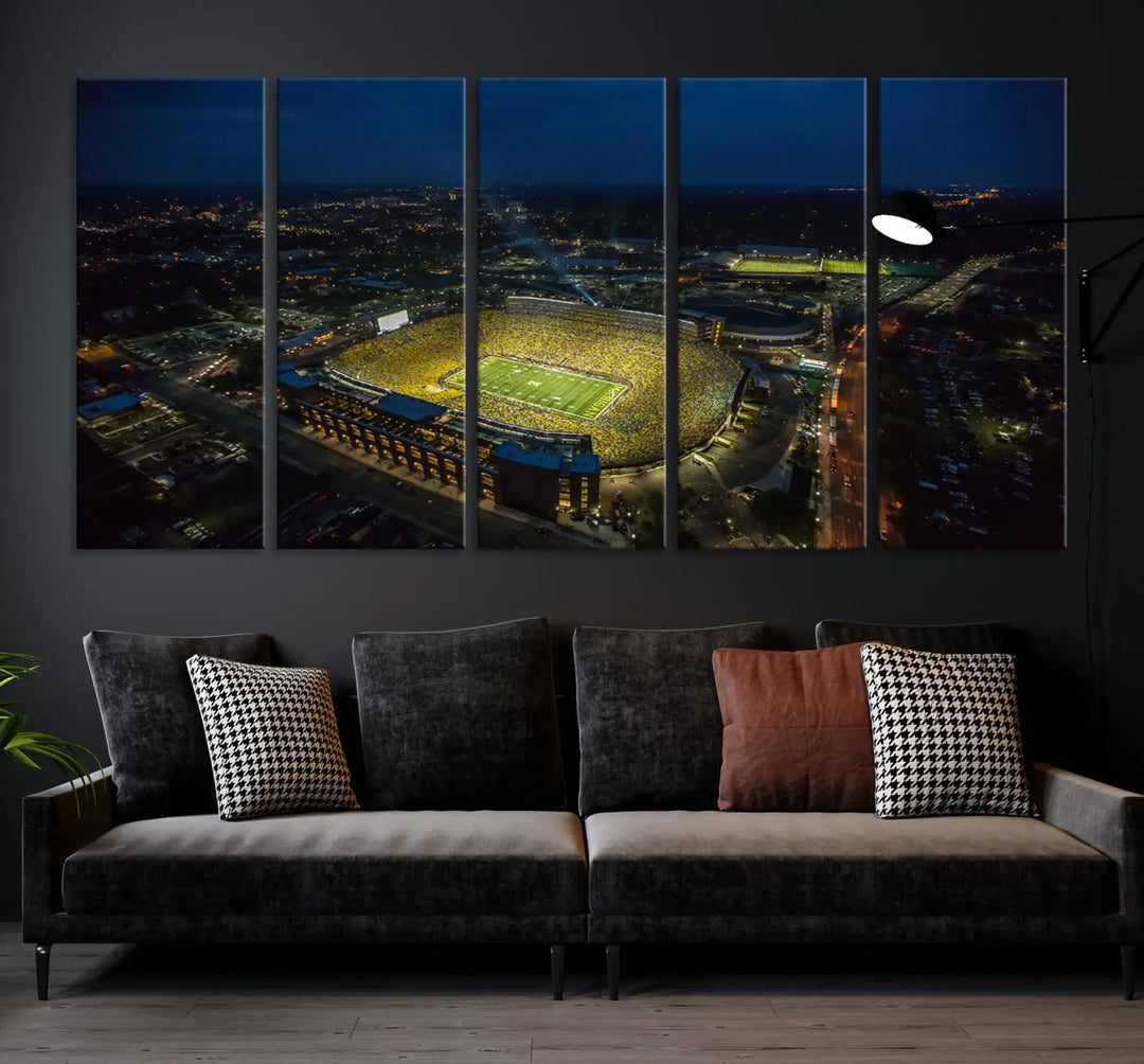 The vibrant energy of game day is perfectly captured in the Michigan Stadium Night Game Wall Art – Sports Arena Aerial View Canvas Print, framed and ready to hang.