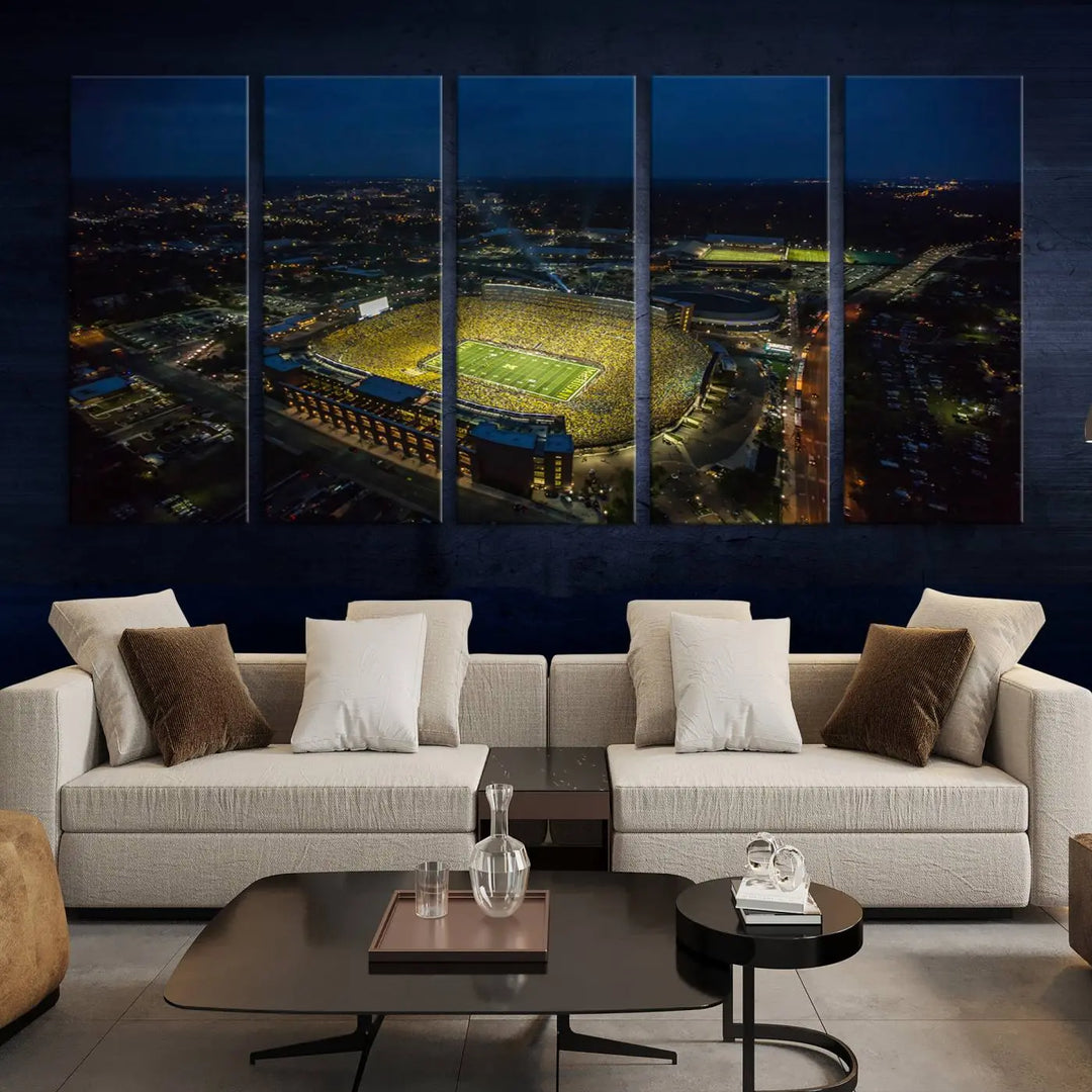 The vibrant energy of game day is perfectly captured in the Michigan Stadium Night Game Wall Art – Sports Arena Aerial View Canvas Print, framed and ready to hang.