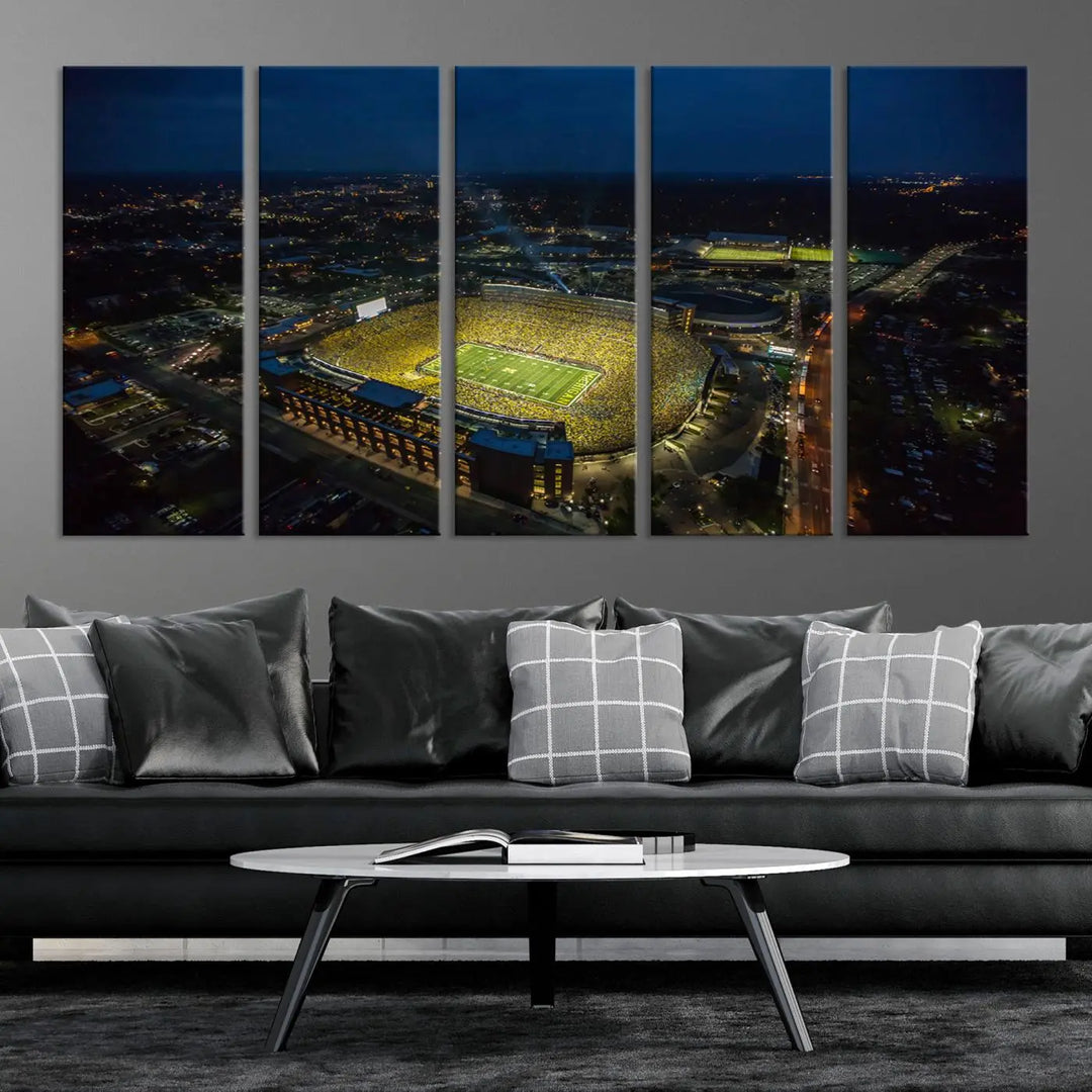 The vibrant energy of game day is perfectly captured in the Michigan Stadium Night Game Wall Art – Sports Arena Aerial View Canvas Print, framed and ready to hang.