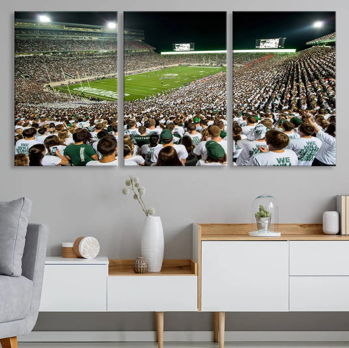 Above the dining table, a gallery-quality Michigan State Spartans Football Team Print on premium canvas is displayed, featuring a panoramic view of East Lansing's Spartan Stadium.