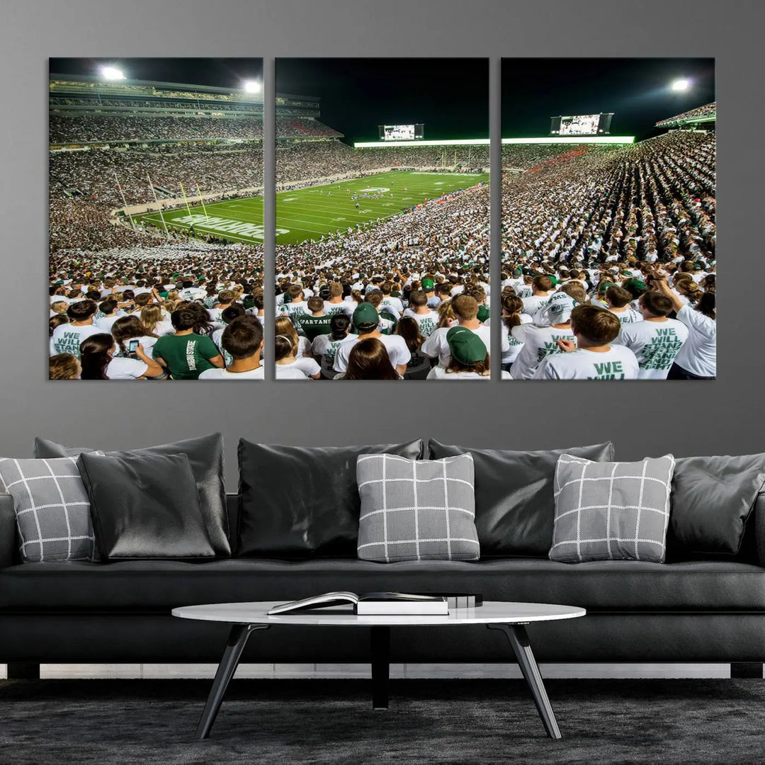 Above the dining table, a gallery-quality Michigan State Spartans Football Team Print on premium canvas is displayed, featuring a panoramic view of East Lansing's Spartan Stadium.