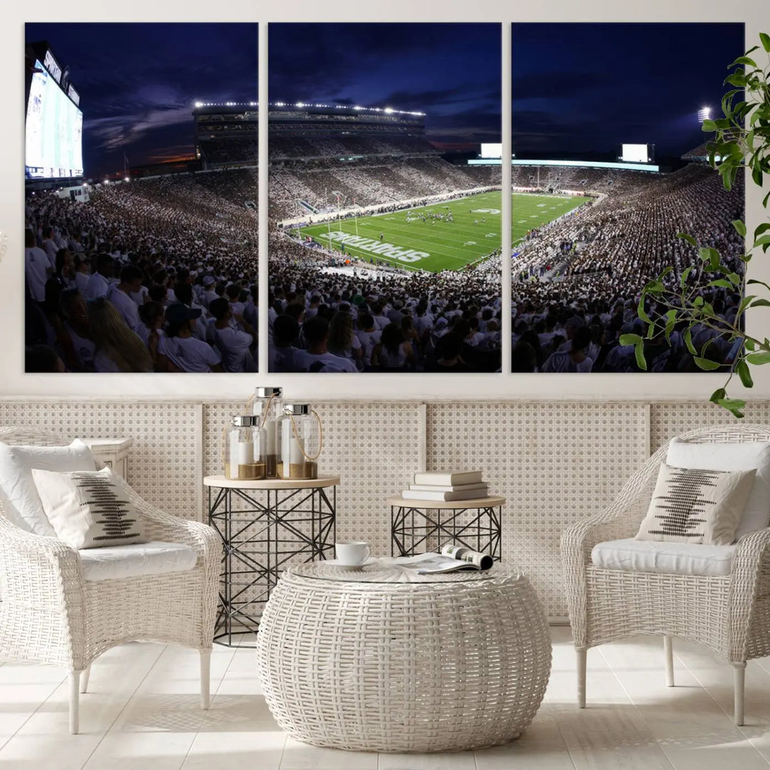 The living room features a wall adorned with a triptych of the Michigan State Spartans Football Team Print - East Lansing Spartan Stadium Wall Art Canvas Print.