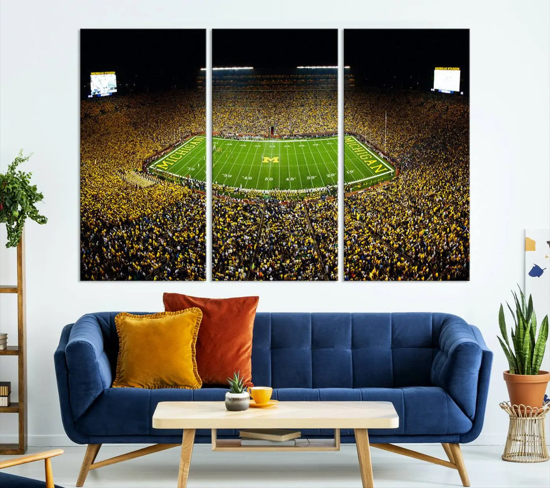 A triptych image vividly captures the electric energy of Michigan Stadium during a night game, with a sea of cheering fans. This Michigan Wolverines Football Team canvas print infuses any home with dynamic spirit and pride.