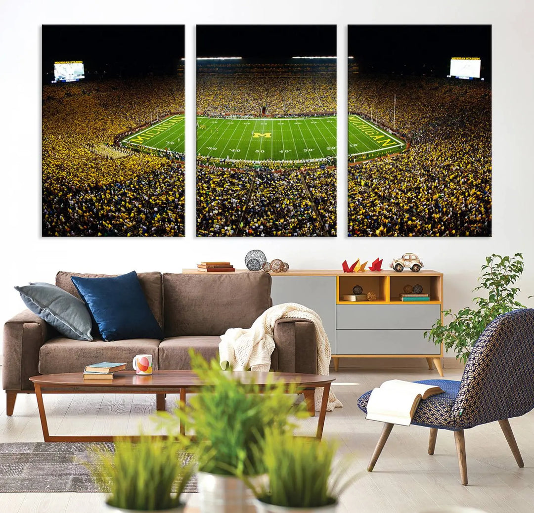 A triptych image vividly captures the electric energy of Michigan Stadium during a night game, with a sea of cheering fans. This Michigan Wolverines Football Team canvas print infuses any home with dynamic spirit and pride.