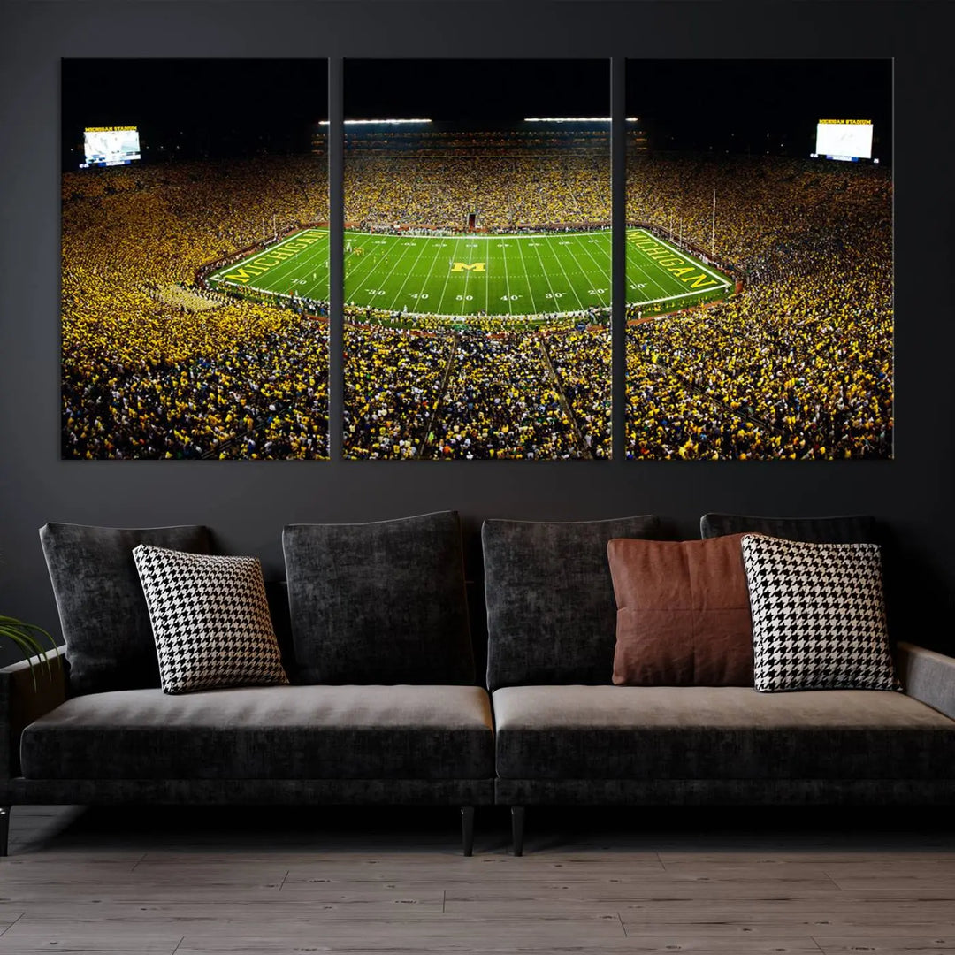 A triptych image vividly captures the electric energy of Michigan Stadium during a night game, with a sea of cheering fans. This Michigan Wolverines Football Team canvas print infuses any home with dynamic spirit and pride.