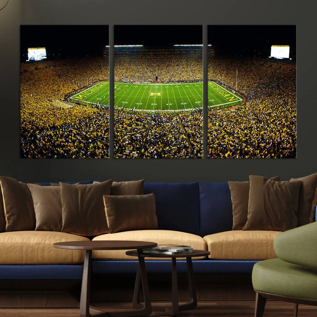 A triptych image vividly captures the electric energy of Michigan Stadium during a night game, with a sea of cheering fans. This Michigan Wolverines Football Team canvas print infuses any home with dynamic spirit and pride.