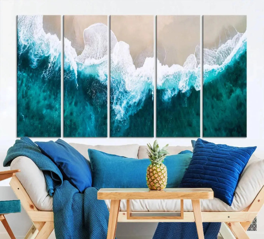 A captivating three-panel "Mind-Blowing Aerial Beach" canvas wall art print, crafted with museum-quality materials and a UV-protective coating, is beautifully hung as the focal point of the room.