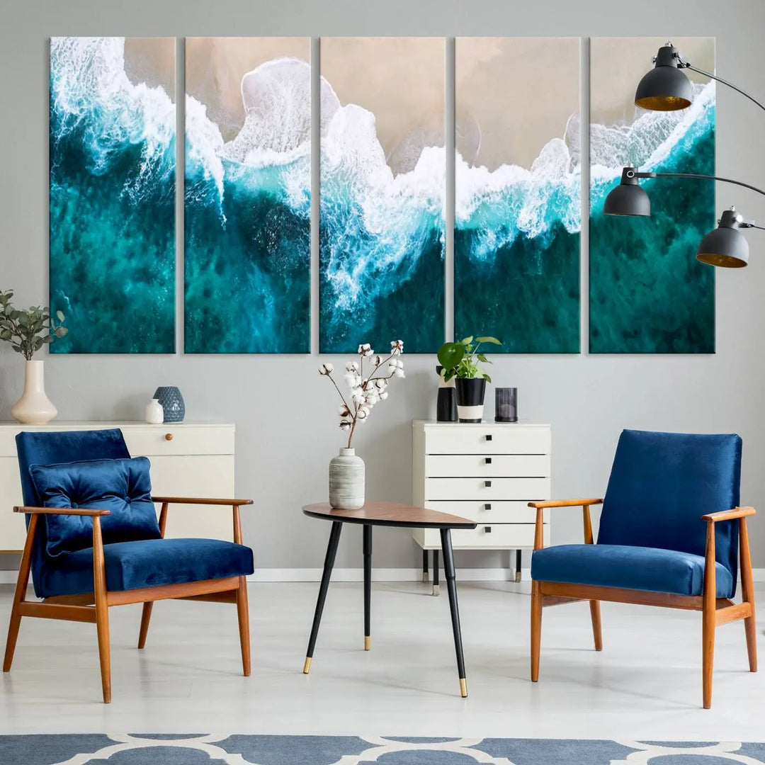 A captivating three-panel "Mind-Blowing Aerial Beach" canvas wall art print, crafted with museum-quality materials and a UV-protective coating, is beautifully hung as the focal point of the room.