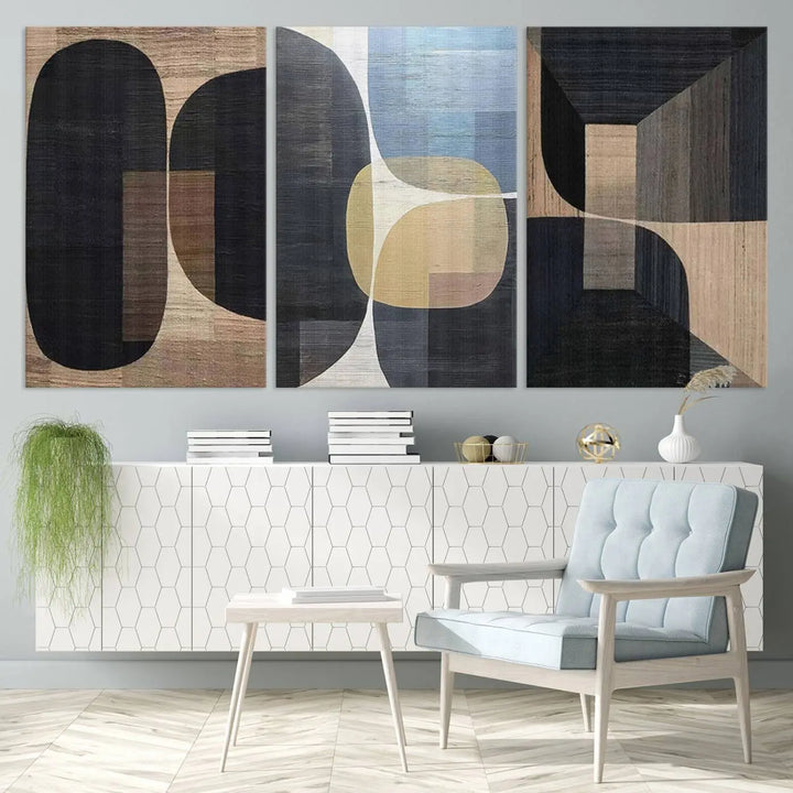 The modern living room exudes elegance with the Minimalist Wabi Sabi Abstract Geometric Wall Art Canvas Print, featuring modern minimalist shapes.