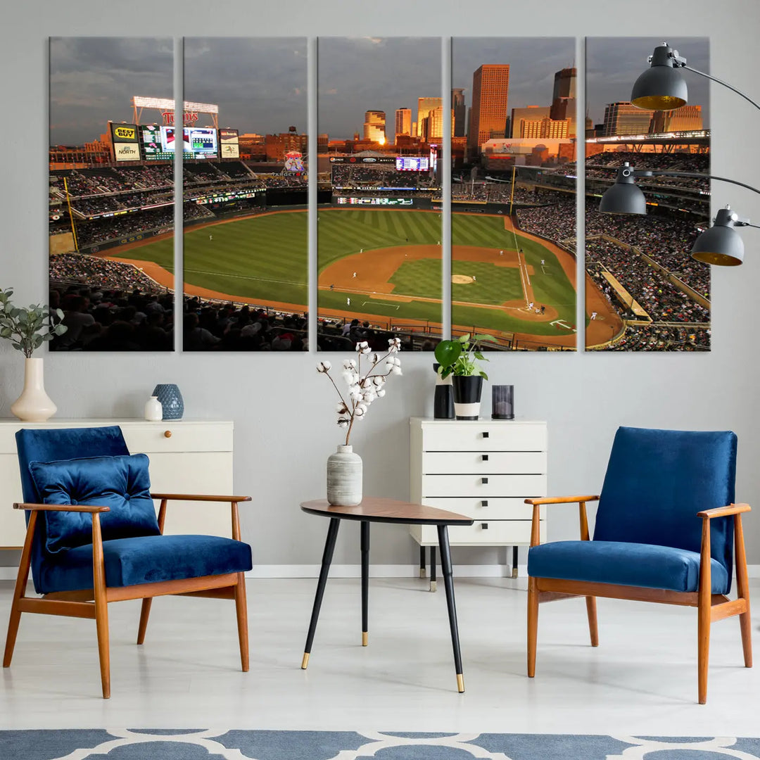 The room features a triptych piece called "Minnesota Twins Baseball Team Print - Minneapolis Target Field Stadium Wall Art Canvas Print." This handmade artwork showcases a baseball stadium at sunset, rendered on premium canvas for a gallery-quality finish.