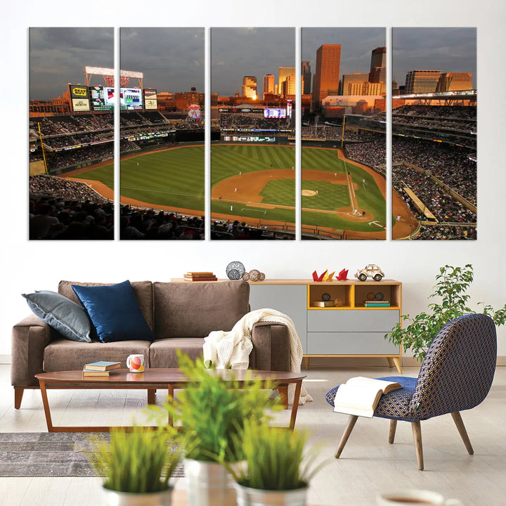 The room features a triptych piece called "Minnesota Twins Baseball Team Print - Minneapolis Target Field Stadium Wall Art Canvas Print." This handmade artwork showcases a baseball stadium at sunset, rendered on premium canvas for a gallery-quality finish.