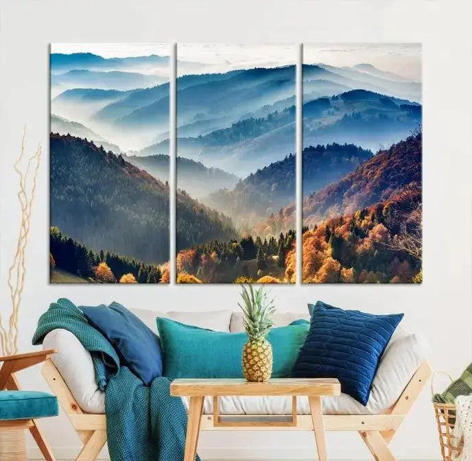 A large "Misty Mountain Sunrise Triptych Canvas Print – Autumn Landscape Wall Art – Scenic Nature Decor – Ready to Hang" is displayed on the wall.