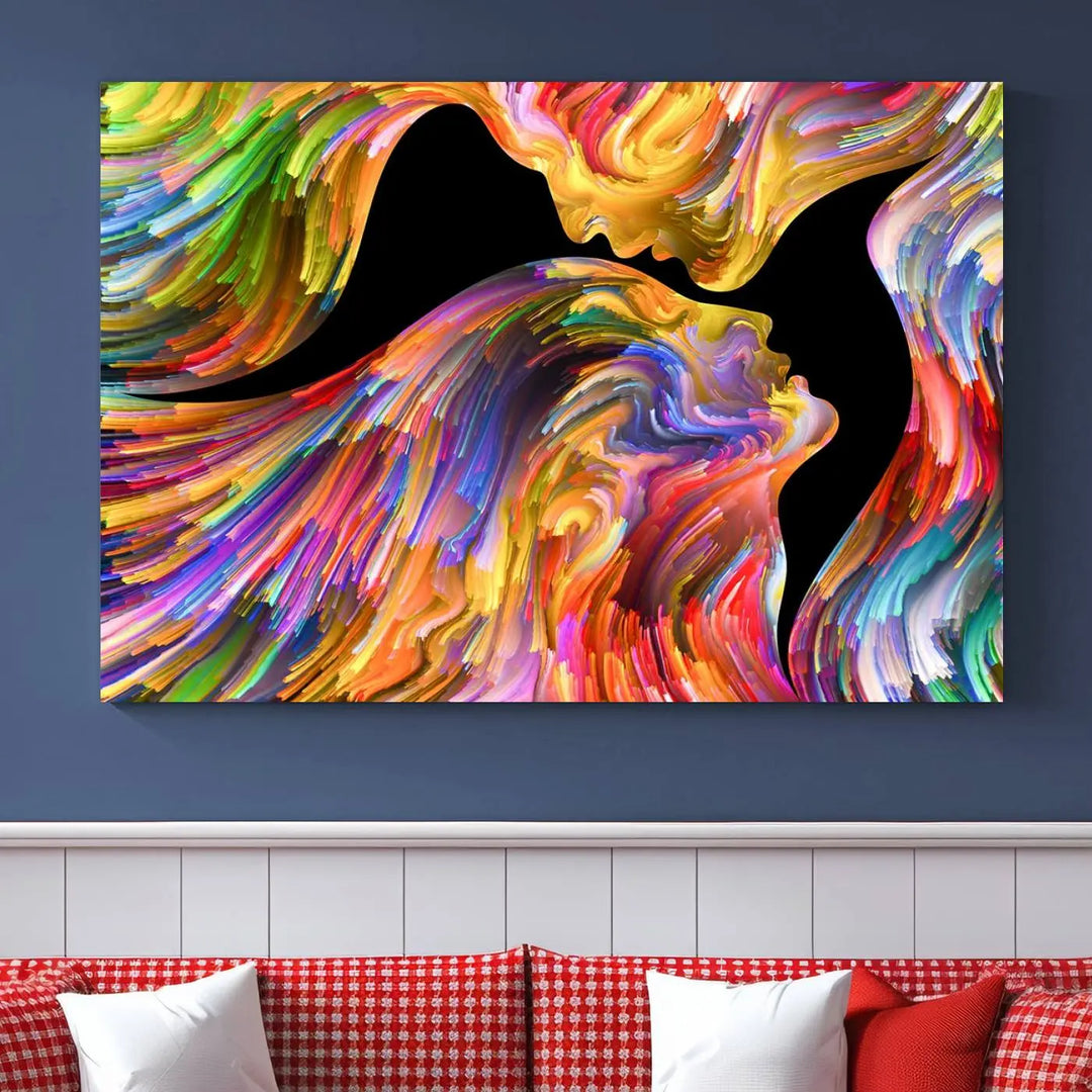 The Mix & Trend Vibrant Colors Abstract Wall Art Canvas Print features a colorful abstract depiction of two faces in profile with vibrant strokes. This museum-quality piece is gallery wrapped and finished with a UV-protective coating to preserve its vivid hues.