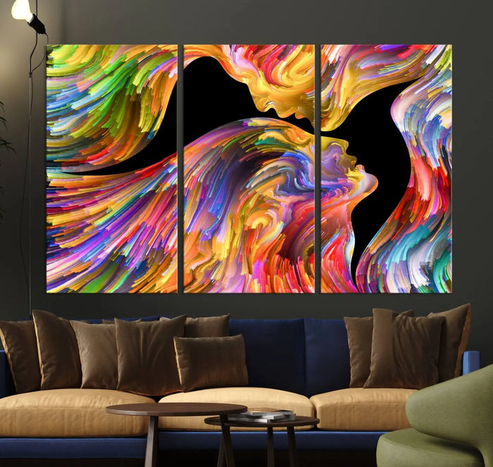 The Mix & Trend Vibrant Colors Abstract Wall Art Canvas Print features a colorful abstract depiction of two faces in profile with vibrant strokes. This museum-quality piece is gallery wrapped and finished with a UV-protective coating to preserve its vivid hues.