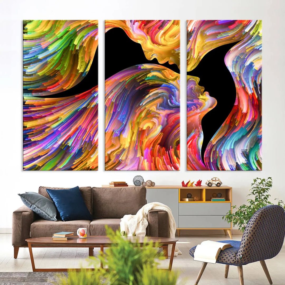 The Mix & Trend Vibrant Colors Abstract Wall Art Canvas Print features a colorful abstract depiction of two faces in profile with vibrant strokes. This museum-quality piece is gallery wrapped and finished with a UV-protective coating to preserve its vivid hues.