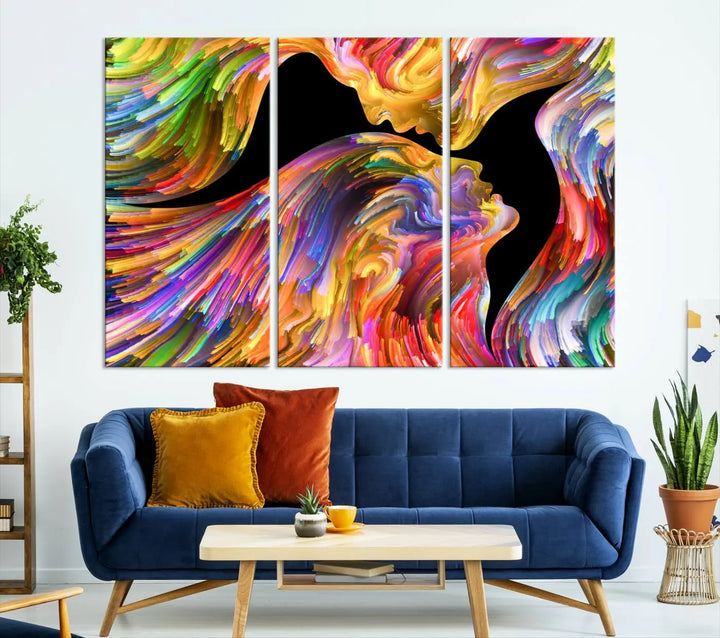 The Mix & Trend Vibrant Colors Abstract Wall Art Canvas Print features a colorful abstract depiction of two faces in profile with vibrant strokes. This museum-quality piece is gallery wrapped and finished with a UV-protective coating to preserve its vivid hues.