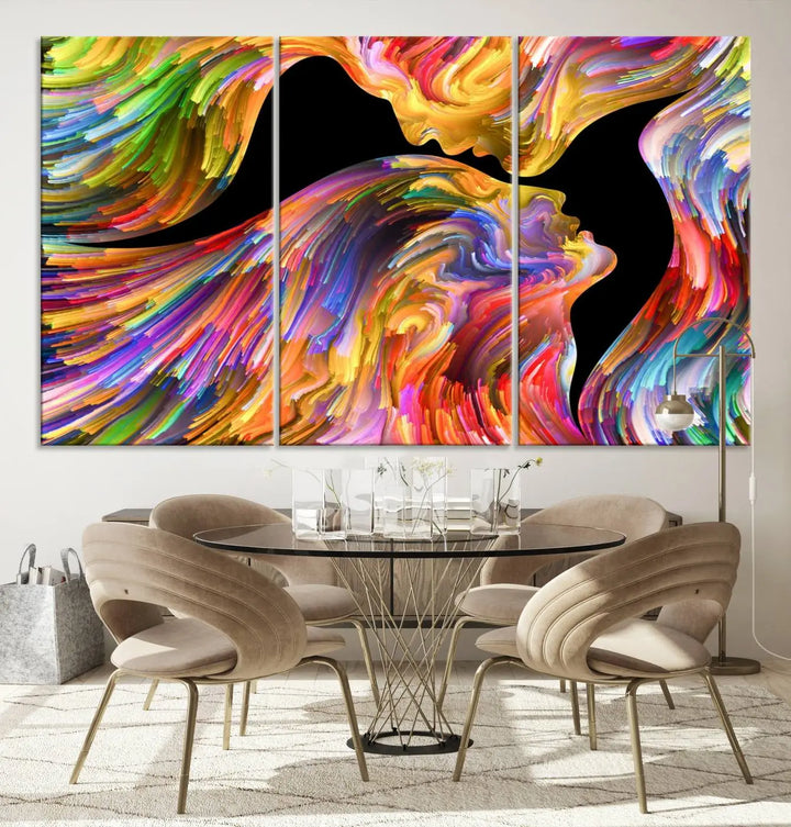 The Mix & Trend Vibrant Colors Abstract Wall Art Canvas Print features a colorful abstract depiction of two faces in profile with vibrant strokes. This museum-quality piece is gallery wrapped and finished with a UV-protective coating to preserve its vivid hues.