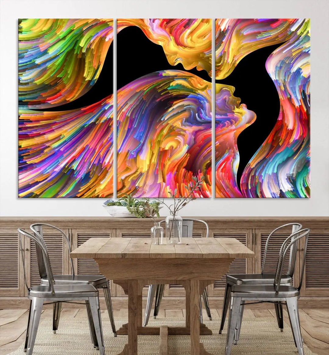 The Mix & Trend Vibrant Colors Abstract Wall Art Canvas Print features a colorful abstract depiction of two faces in profile with vibrant strokes. This museum-quality piece is gallery wrapped and finished with a UV-protective coating to preserve its vivid hues.