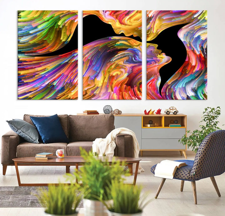 The Mix & Trend Vibrant Colors Abstract Wall Art Canvas Print features a colorful abstract depiction of two faces in profile with vibrant strokes. This museum-quality piece is gallery wrapped and finished with a UV-protective coating to preserve its vivid hues.