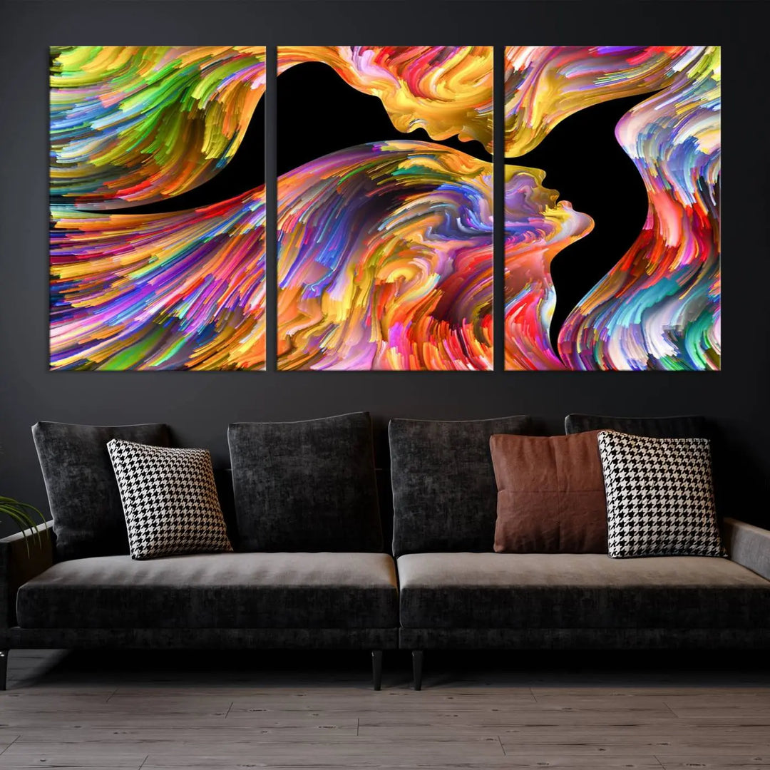 The Mix & Trend Vibrant Colors Abstract Wall Art Canvas Print features a colorful abstract depiction of two faces in profile with vibrant strokes. This museum-quality piece is gallery wrapped and finished with a UV-protective coating to preserve its vivid hues.