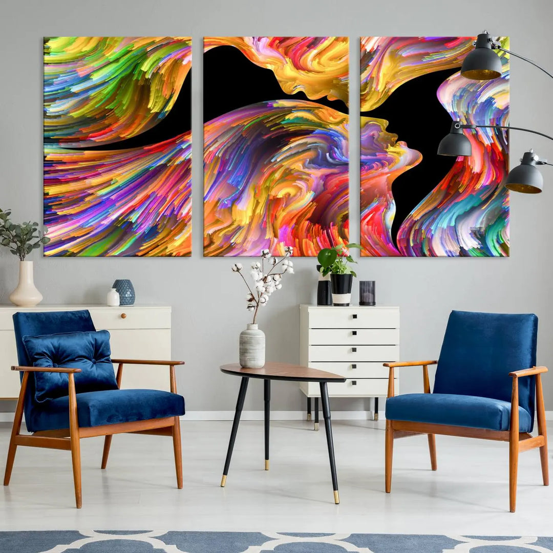 The Mix & Trend Vibrant Colors Abstract Wall Art Canvas Print features a colorful abstract depiction of two faces in profile with vibrant strokes. This museum-quality piece is gallery wrapped and finished with a UV-protective coating to preserve its vivid hues.