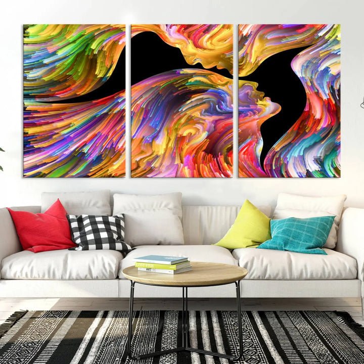 The Mix & Trend Vibrant Colors Abstract Wall Art Canvas Print features a colorful abstract depiction of two faces in profile with vibrant strokes. This museum-quality piece is gallery wrapped and finished with a UV-protective coating to preserve its vivid hues.