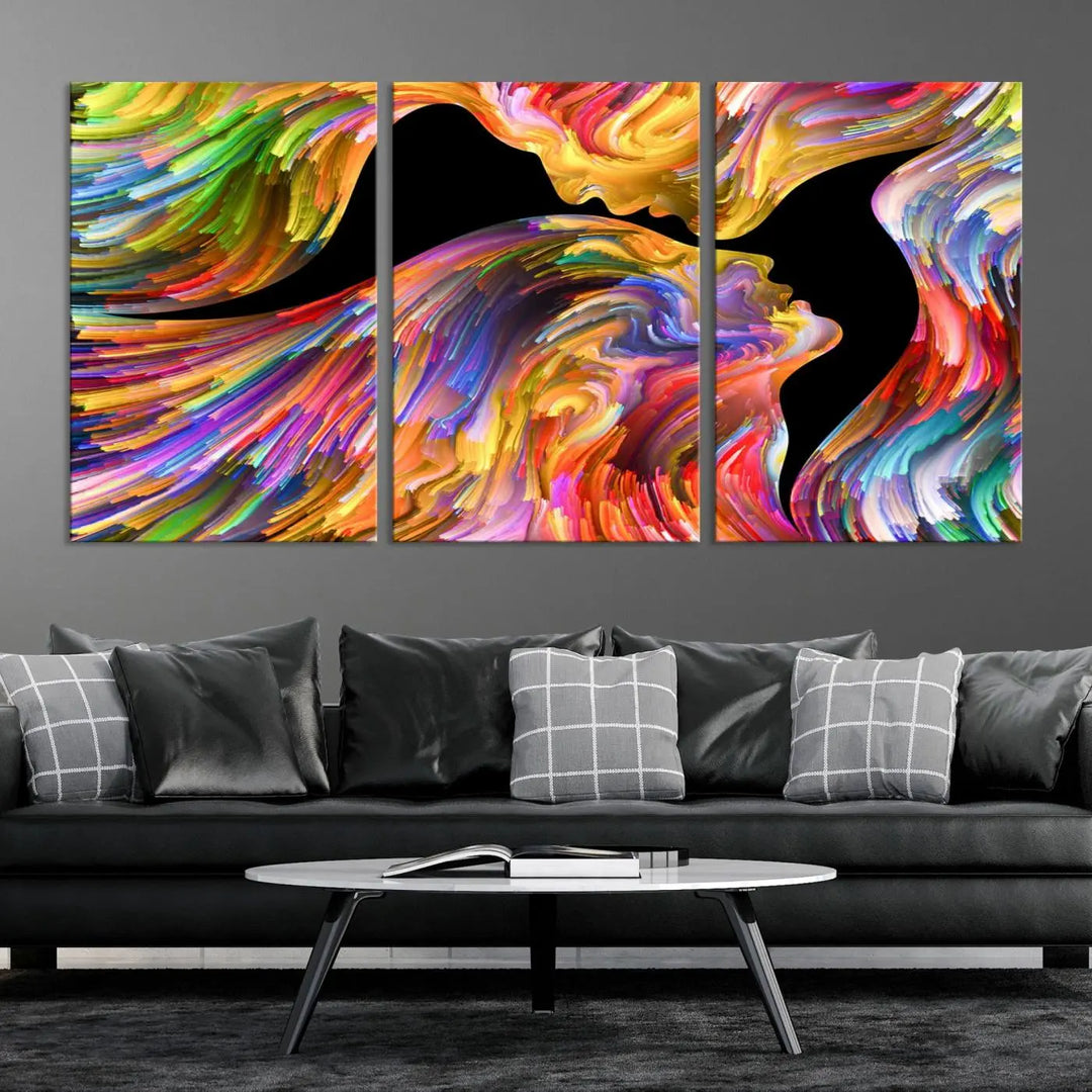 The Mix & Trend Vibrant Colors Abstract Wall Art Canvas Print features a colorful abstract depiction of two faces in profile with vibrant strokes. This museum-quality piece is gallery wrapped and finished with a UV-protective coating to preserve its vivid hues.