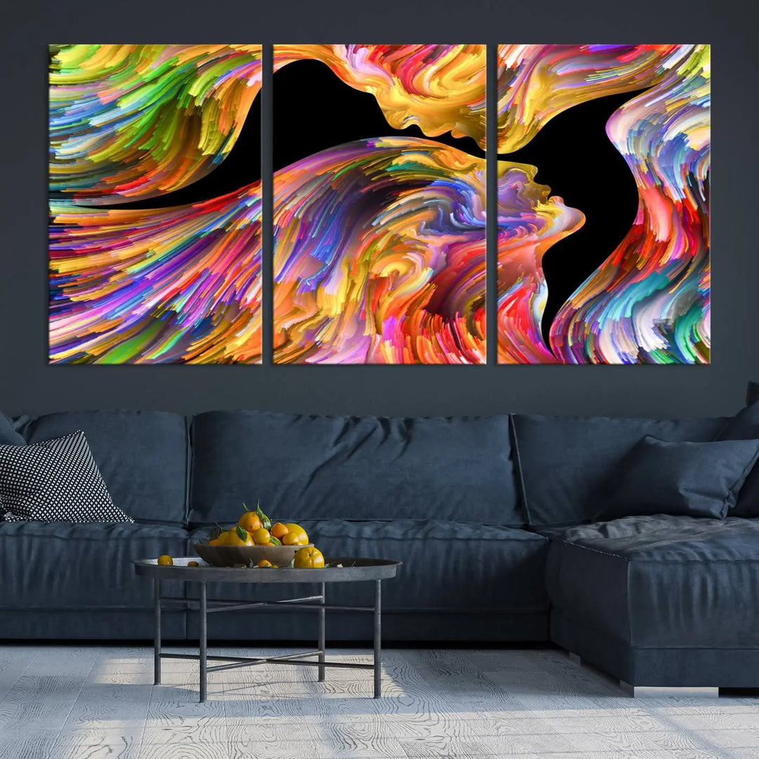 The Mix & Trend Vibrant Colors Abstract Wall Art Canvas Print features a colorful abstract depiction of two faces in profile with vibrant strokes. This museum-quality piece is gallery wrapped and finished with a UV-protective coating to preserve its vivid hues.