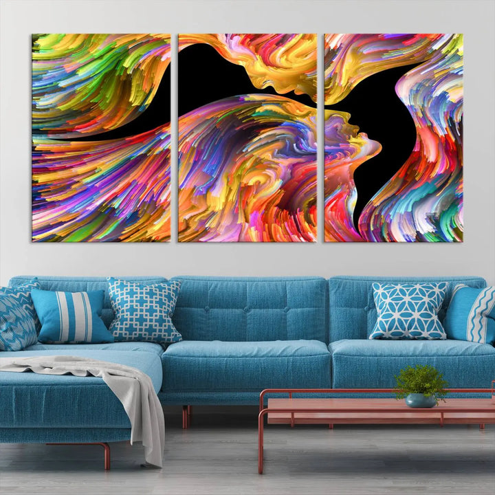 The Mix & Trend Vibrant Colors Abstract Wall Art Canvas Print features a colorful abstract depiction of two faces in profile with vibrant strokes. This museum-quality piece is gallery wrapped and finished with a UV-protective coating to preserve its vivid hues.