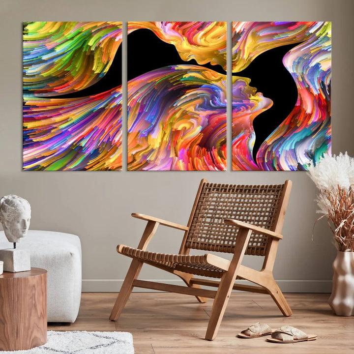 The Mix & Trend Vibrant Colors Abstract Wall Art Canvas Print features a colorful abstract depiction of two faces in profile with vibrant strokes. This museum-quality piece is gallery wrapped and finished with a UV-protective coating to preserve its vivid hues.