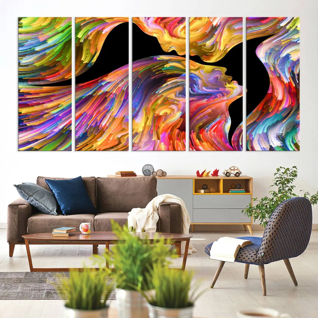 The Mix & Trend Vibrant Colors Abstract Wall Art Canvas Print features a colorful abstract depiction of two faces in profile with vibrant strokes. This museum-quality piece is gallery wrapped and finished with a UV-protective coating to preserve its vivid hues.