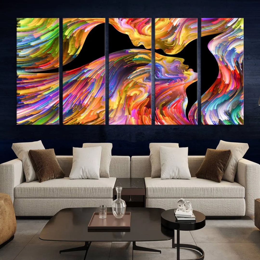 The Mix & Trend Vibrant Colors Abstract Wall Art Canvas Print features a colorful abstract depiction of two faces in profile with vibrant strokes. This museum-quality piece is gallery wrapped and finished with a UV-protective coating to preserve its vivid hues.