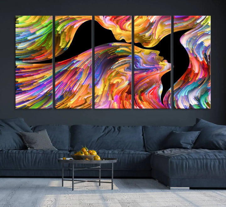 The Mix & Trend Vibrant Colors Abstract Wall Art Canvas Print features a colorful abstract depiction of two faces in profile with vibrant strokes. This museum-quality piece is gallery wrapped and finished with a UV-protective coating to preserve its vivid hues.