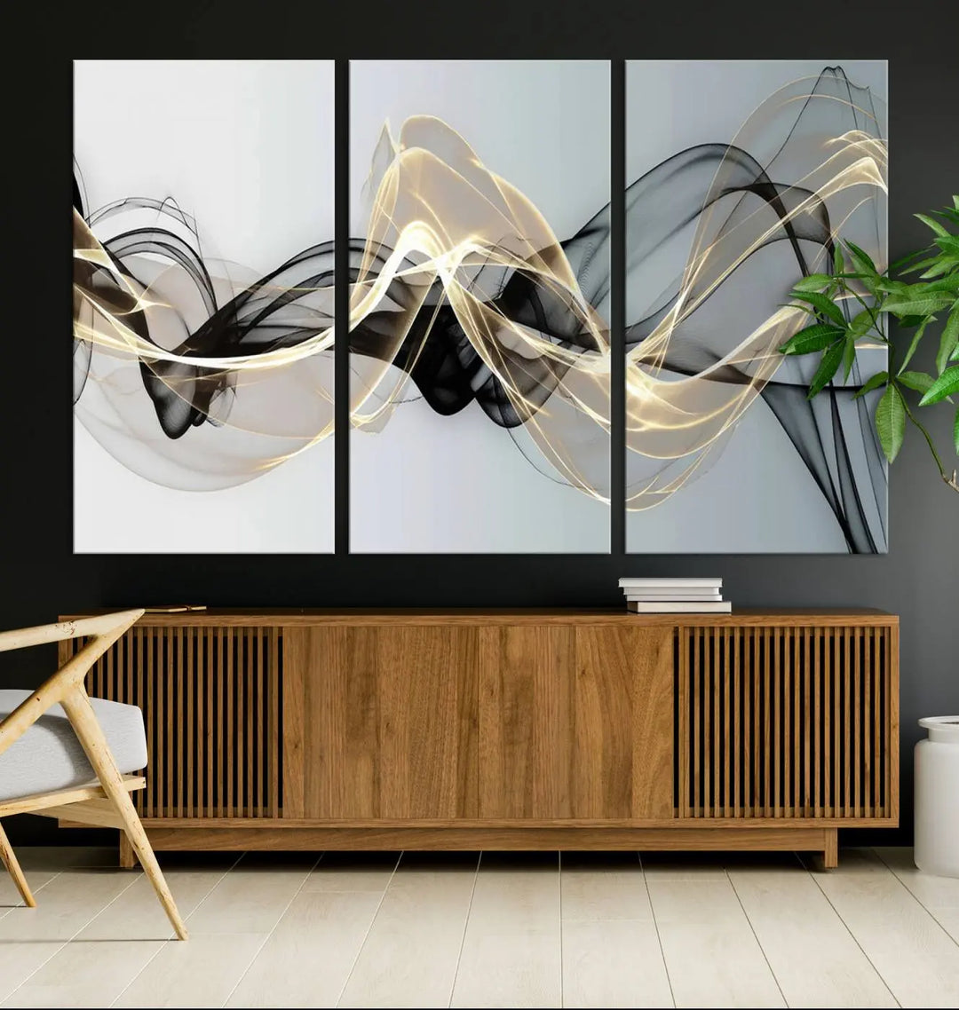 Modern Abstract Art Multi Panel Wall Art Canvas Print featuring flowing black and gold waves.