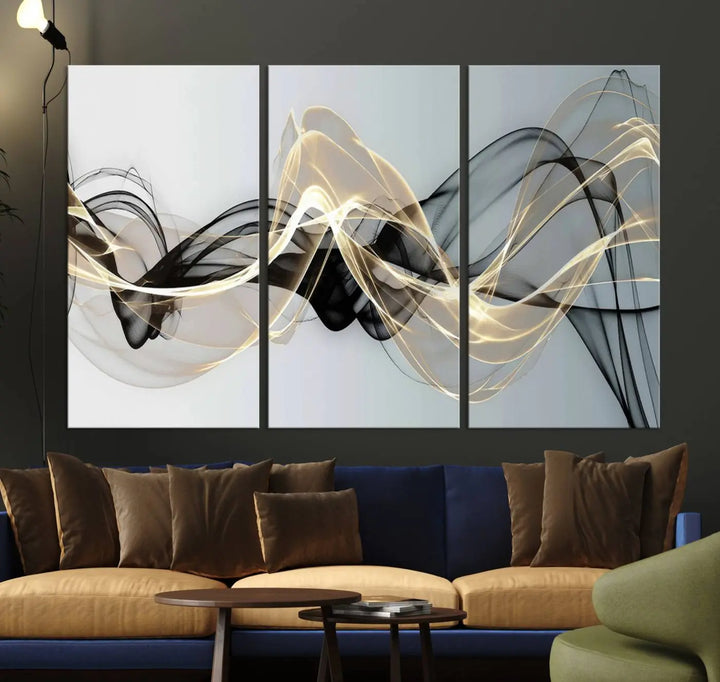 Modern Abstract Art Multi Panel Wall Art Canvas Print featuring flowing black and gold waves.