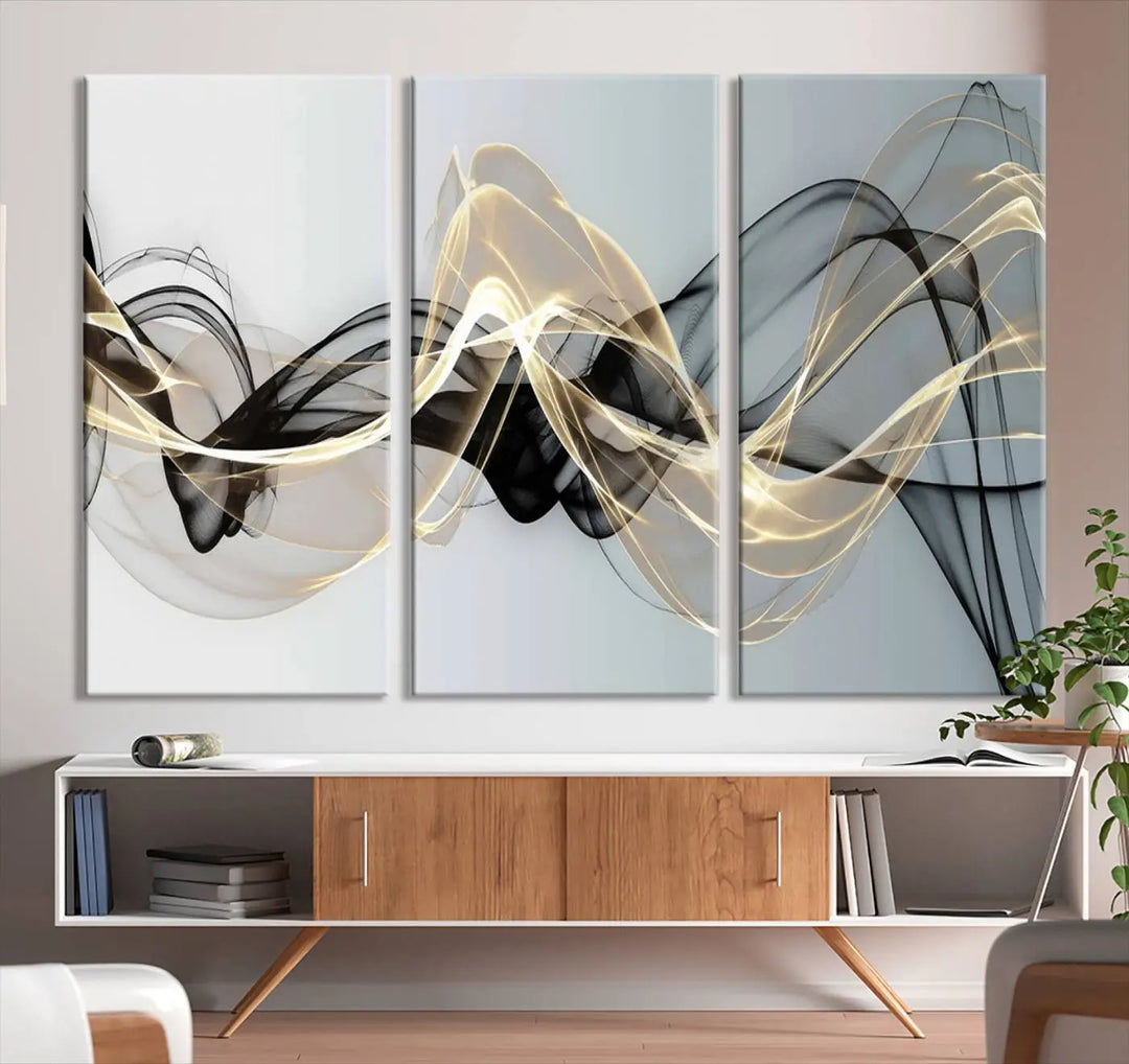 Modern Abstract Art Multi Panel Wall Art Canvas Print featuring flowing black and gold waves.