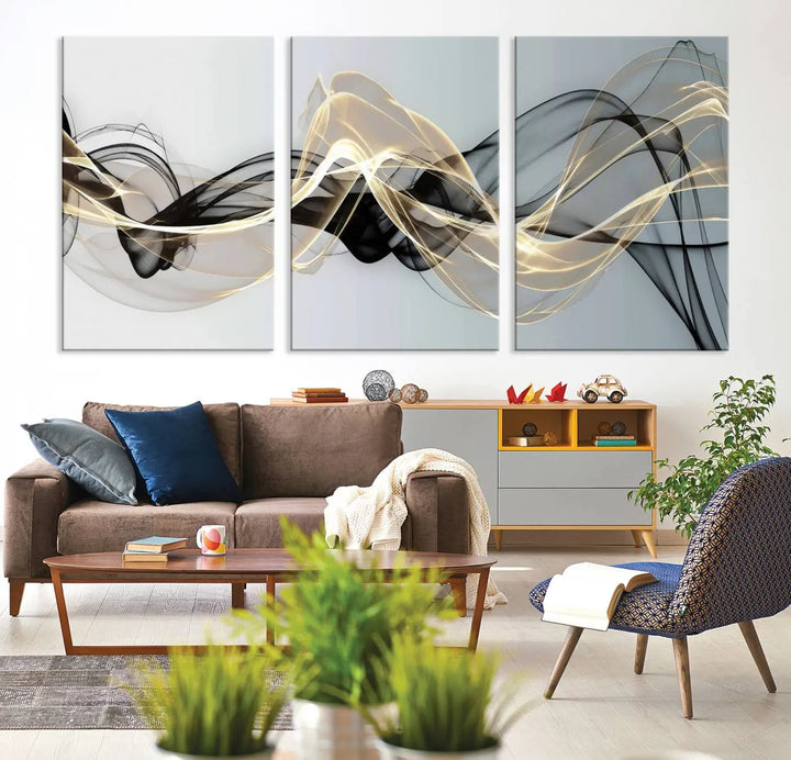 Modern Abstract Art Multi Panel Wall Art Canvas Print featuring flowing black and gold waves.